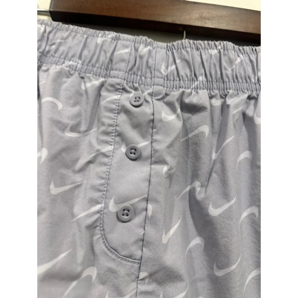 Nike women's Sportswear Woven Swoosh Shorts‎ Lavender Purple All Over Print L